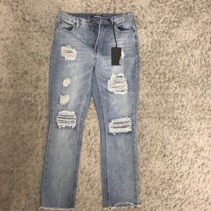 Trace Denim skinny jeans w/ holes
